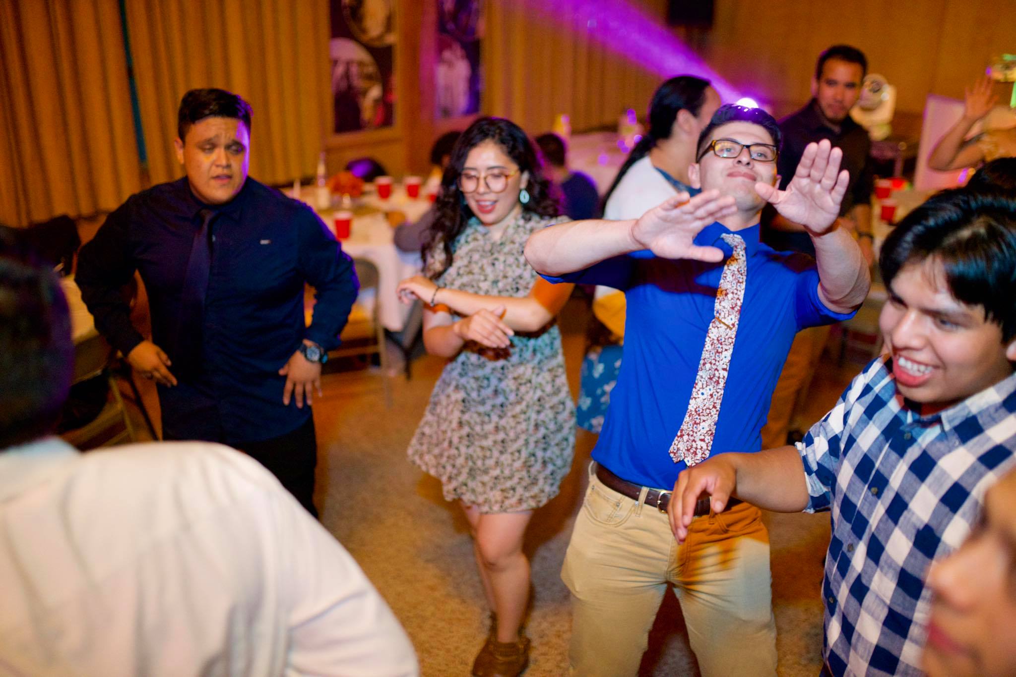 Young adults dancing at a community event