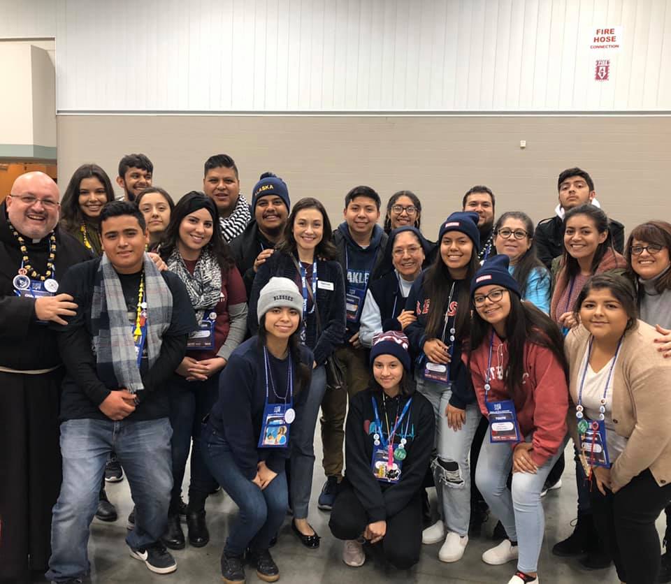 Group of youth and young adults posing together